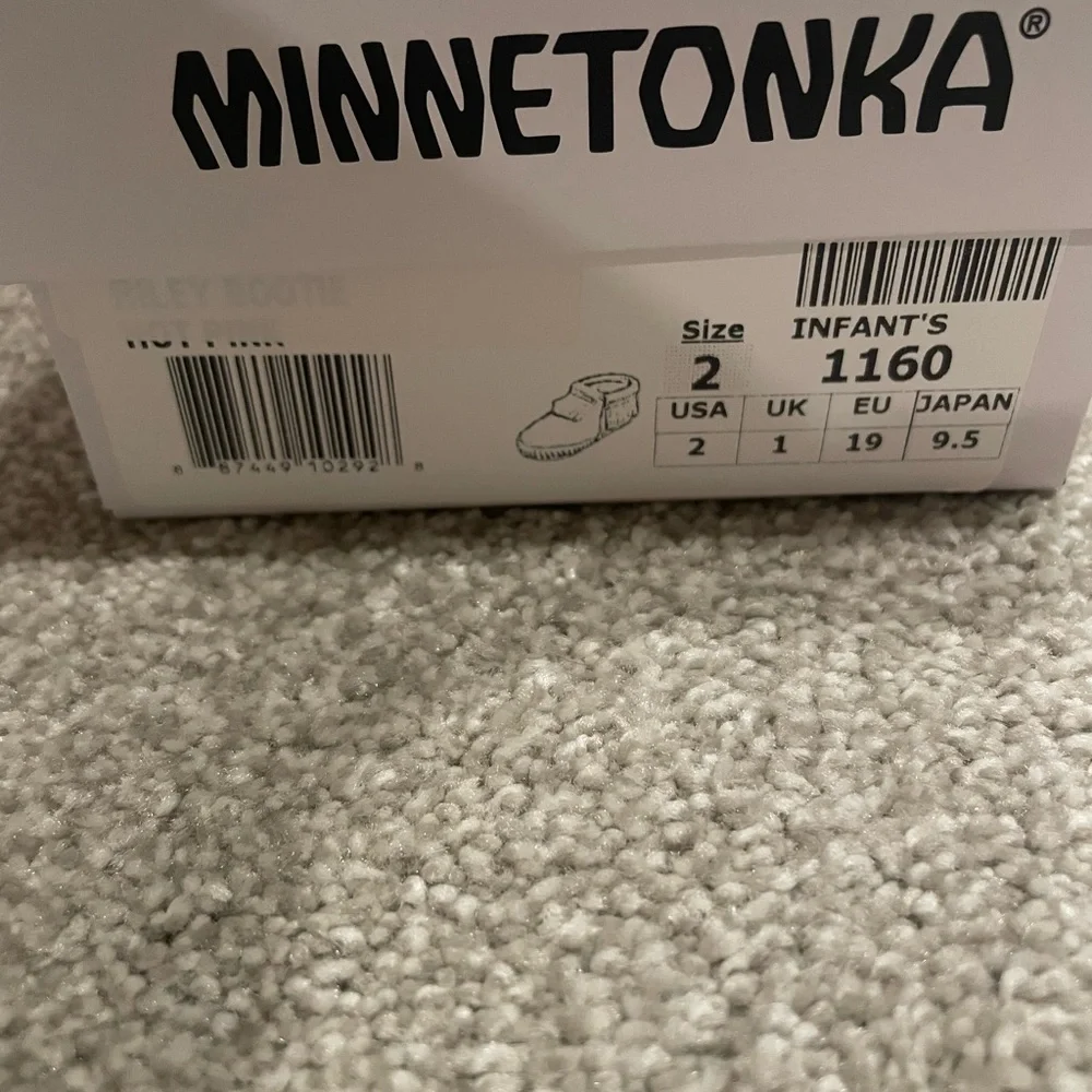 Minnetonka Kids Moccasins in Bright Pink